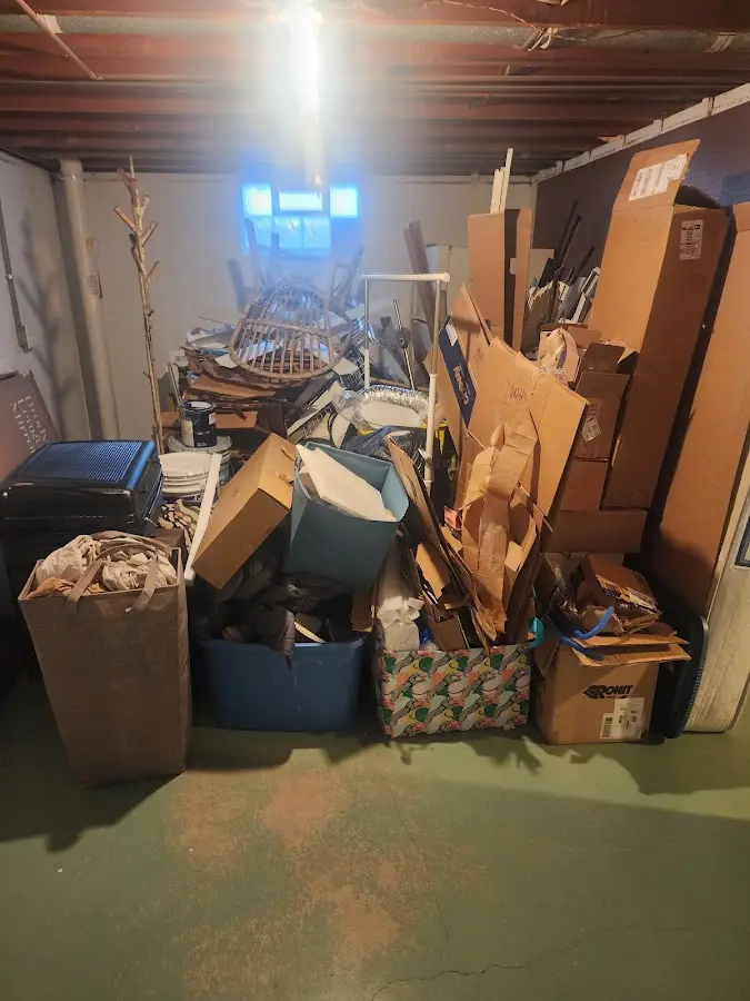 Roll-off dumpster container at job site for 6 Yard Dumpster Rental in Lenox